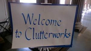 a sign reading 'welcome to clutterworks'