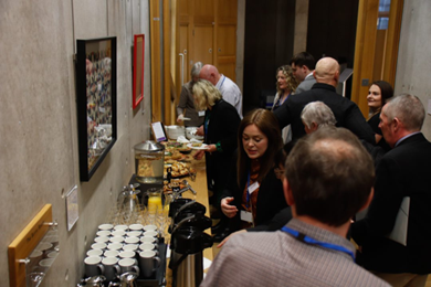 Guests getting snacks and drinks in the Parliament